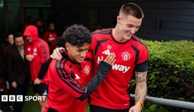 JJ Gabriel (left) has a joke with Manchester United team-mate Benjamin Sesko
