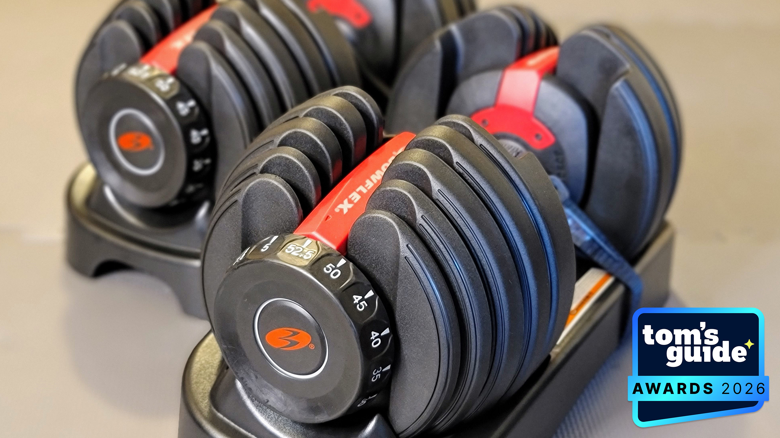 The Bowflex 552 adjustable dumbbells with a TG Awards 2026 badge