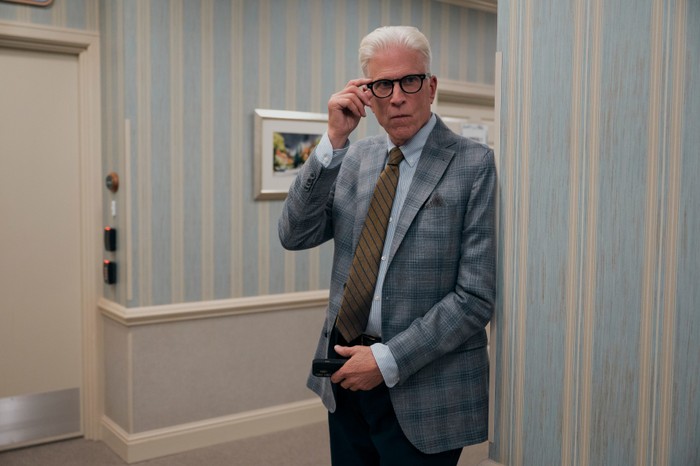 Ted Danson as Charles in A Man on the Inside, speaking on the phone