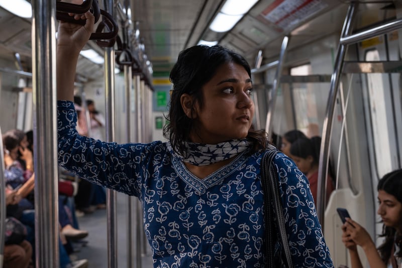 Tripti Jain rides on the New Delhi metro system. Photograph: Karan Deep Singh/The New York Times
                      