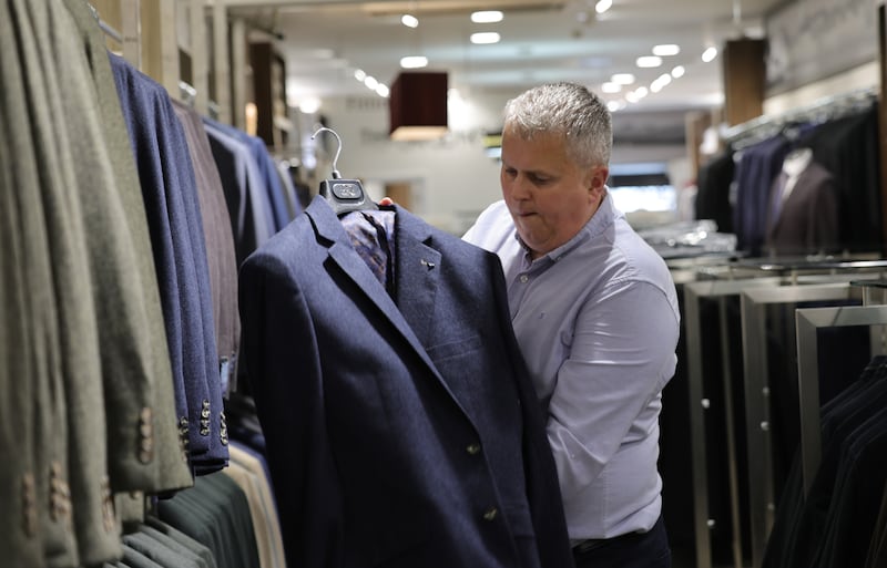 John Conran at work in the suit department of  Anthony Ryans. Photograph: Bryan O’Brien/The Irish Times 