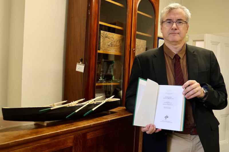 Dublin Institute of Advanced Studies professor of Celtic Studies David Stifter with the new edition of the Voyage of St Brendan. 