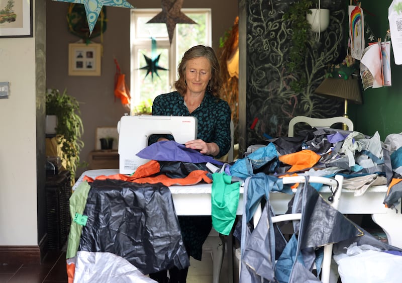 Noreen Lucey, Dunlavin, Co Wicklow, using recycled tents to make bunting flags, lanyards and other items. She is shortlisted for the Net Zero Hero category in the Greenest Places competition. Photograph: Dara Mac Dónaill
