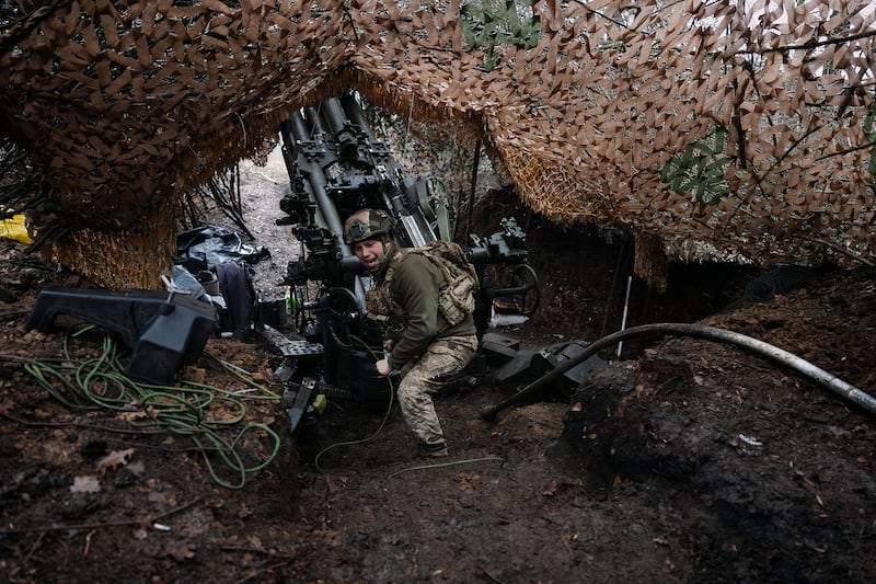 A Ukrainian artillery unit fires a howitzer at Russian positions near Pokrovsk, in eastern Ukraine, in December 2025. Photograph: Tyler Hicks/The New York Times
                      
