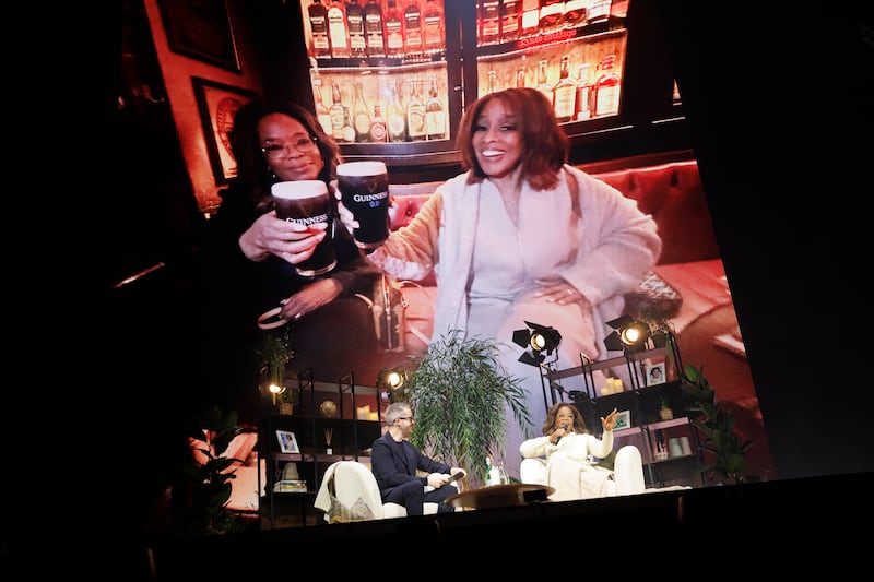 Oprah Winfrey chats to David Meade against a backdrop of her holding Guinness. Photograph: Conor McCabe Photography