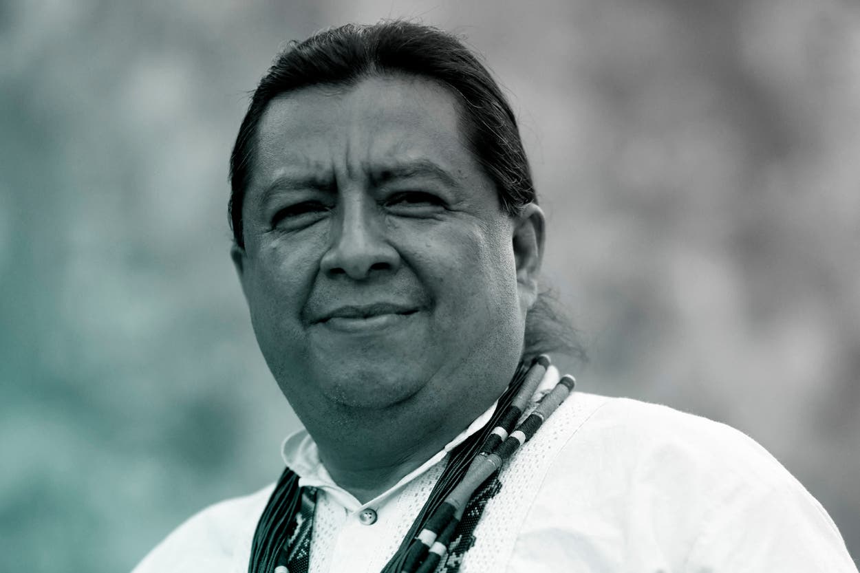 2026climate100 Juan Carlos Jintiach 

Juan Carlos Jintiach from Ecuador's Shuar Indigenous group poses for a portrait after giving a testimony to AFP during the Free Land Camp (ATL-Acampamento Terra Livre) in Brasilia on April 7, 2025. This portrait is part of a photo essay of indigenous leaders who were asked to share their perspectives about climate change and indigenous rights with the world and among themselves. This is Juan Carlos' message: "I believe that we are at a key moment, conjunctural, to ask for the solidarity of the international community with the situation of the indigenous peoples' territories." (Photo by MAURO PIMENTEL / AFP) (Photo by MAURO PIMENTEL/AFP via Getty Images)