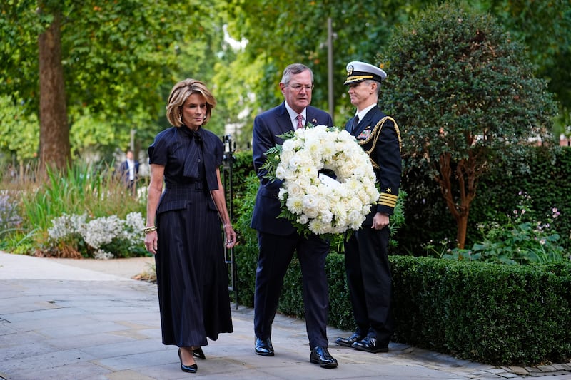 US ambassador Warren Stephens and his wife Harriet Stephens lay a wreath in Grosvenor Square, London, marking the 25th anniversary of the 9/11 attacks. Photograph: Jordan Pettitt/PA Wire