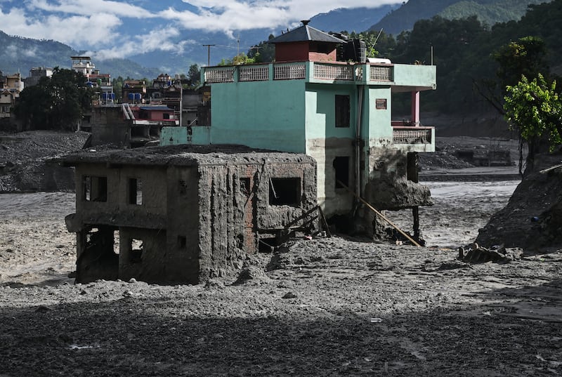 The "miracle house" stands tall amid sludge near Trishuli river in the aftermath of flash floods in Nepal's Nuwakot district. Photograph: Arun SANKAR/AFP via Getty Images
