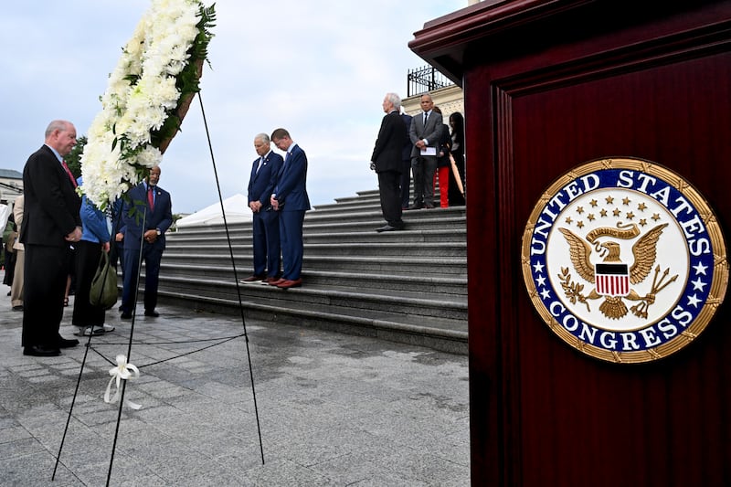 Former members of Congress and other invitees bow their heads during a moment of silence at the end of a Former Members of Congress 9/11 Memorial Service on Capitol Hill on September 11th, 2026 in Washington, DC. Photograph: Roberto Schmidt/Getty Images.
