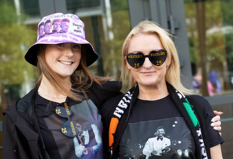Olivia with her mother, Jade Davies, from Liverpool, outside the 3Arena, Dublin, for the first Westlife Concert. Photograph: Sam BOAL/Collins  