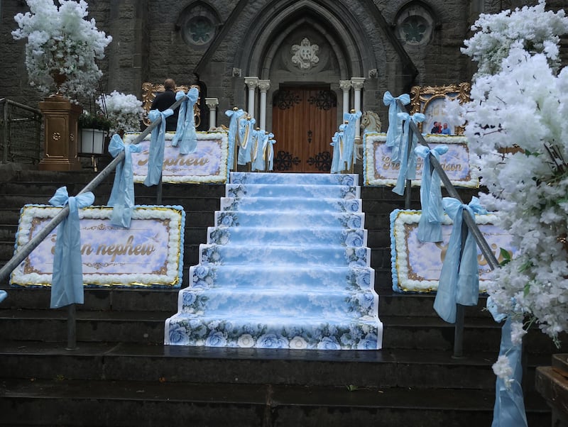 After the Mass, Peter’s casket was shouldered by mourners to a waiting hearse and carriage, led by four white horses. Photo: Brendan Gleeson