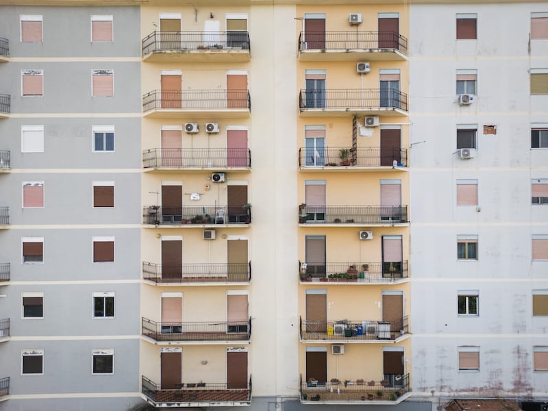 Air-conditioning units at an apartment building in Agrigento, Italy. Photograph: Gianni Cipriano/The New York Times
                      