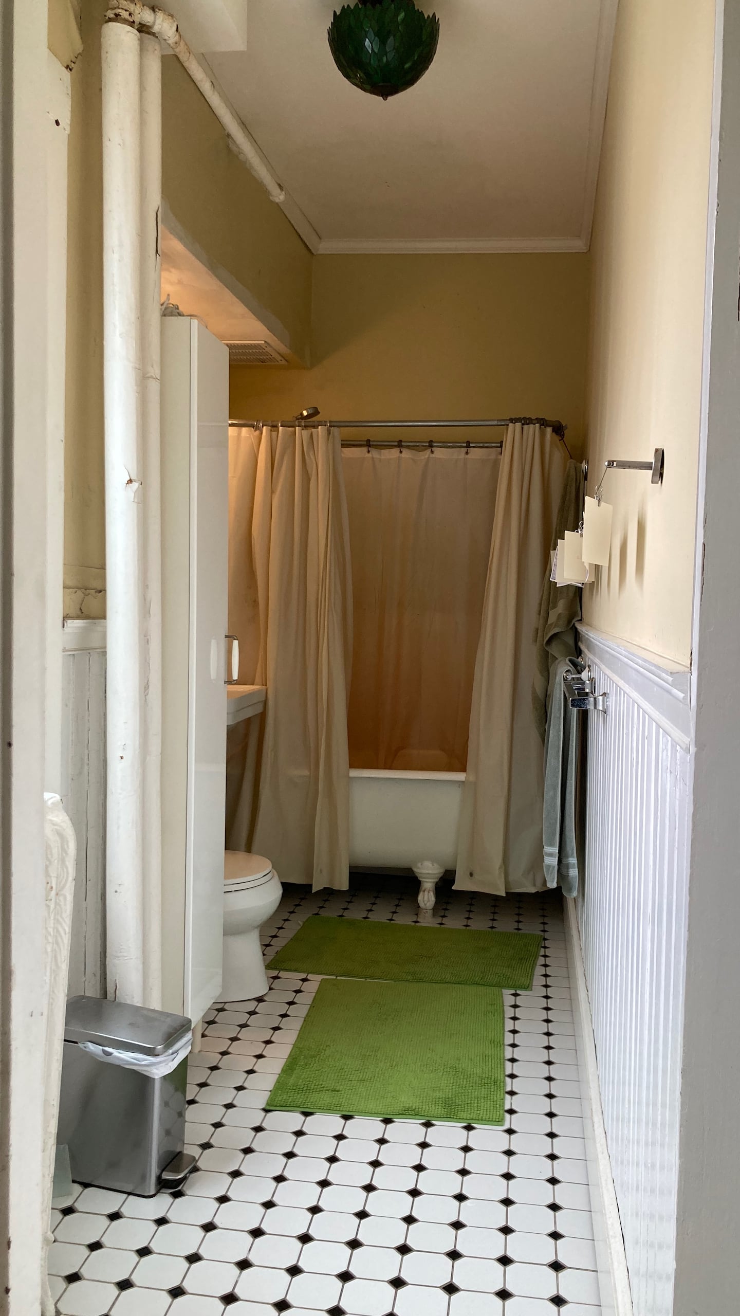 Before: The full bathroom at Nick Andersen and Luke Massa's Cambridge home.