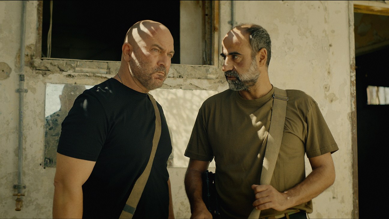 (L to R) Lior Raz as Doron Kavillio Yaakov Zada-Daniel as Eli in Fauda.