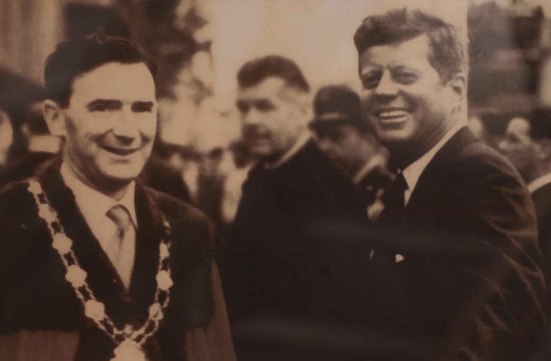 Picture hanging in the store shows Paddy Ryan, then owner of Anthony Ryans, greeting US president John F Kennedy during his visit to Galway in June 1963. Photograph: Bryan O’Brien/The Irish Times