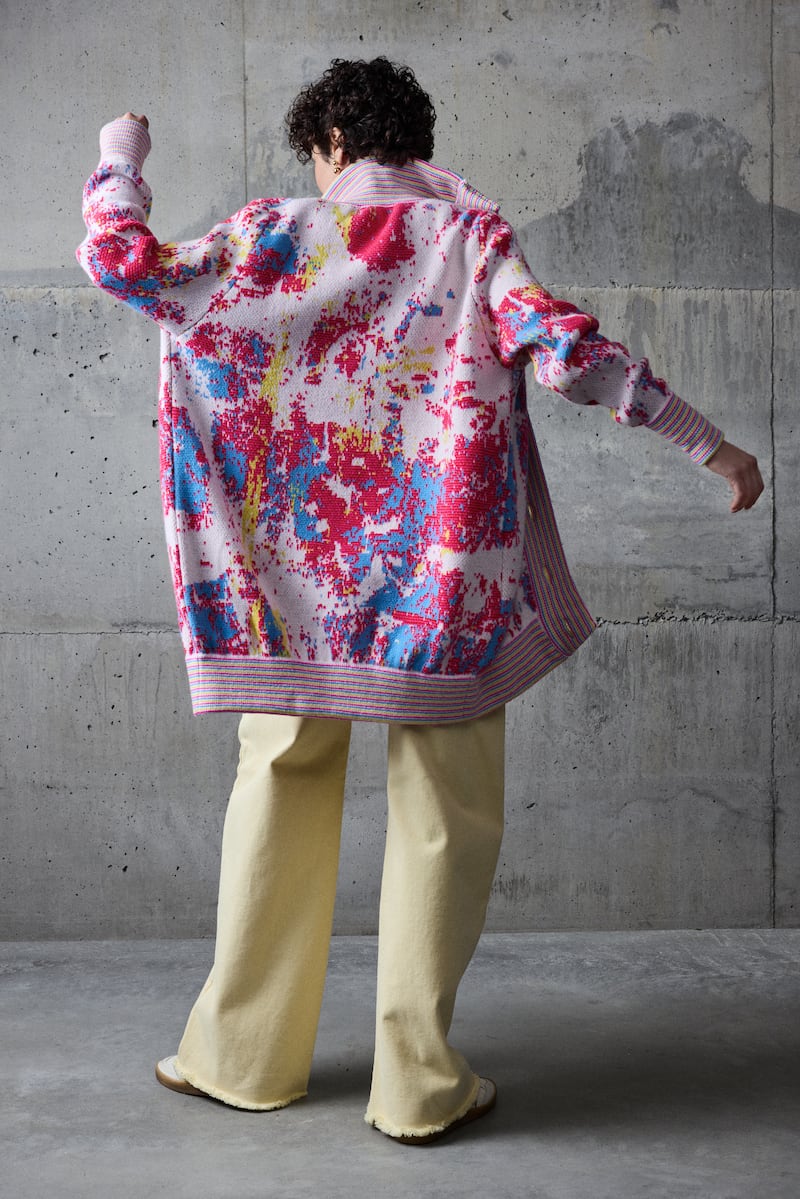 Urban Aran autumn-winter 2026: Long knit bomber with striped collar in fuschia, sunbeam, €425