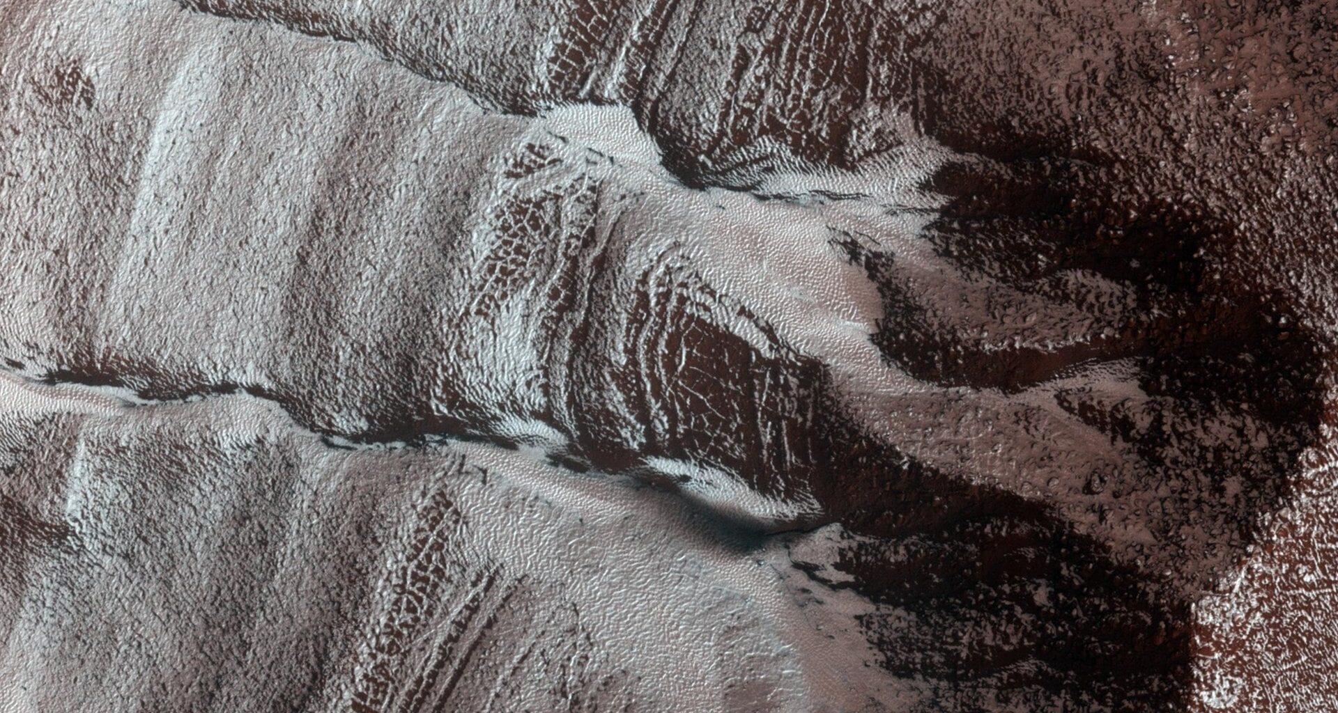 Some of the "frosted" gullies as seen on Mars. Credit - NASA/JPL-Caltech/University of Arizona