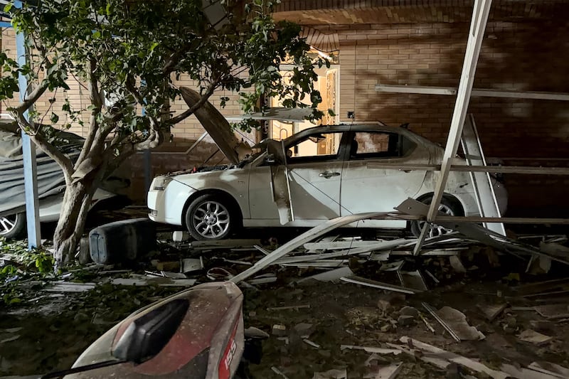 A destroyed vehicle is pictured at the site of an overnight strike in Kuhestak, Sirik County, in Iran's southern Hormozgan province. Photograph: Masoud Mohamadi/Tasnim News/AFP via Getty Images
