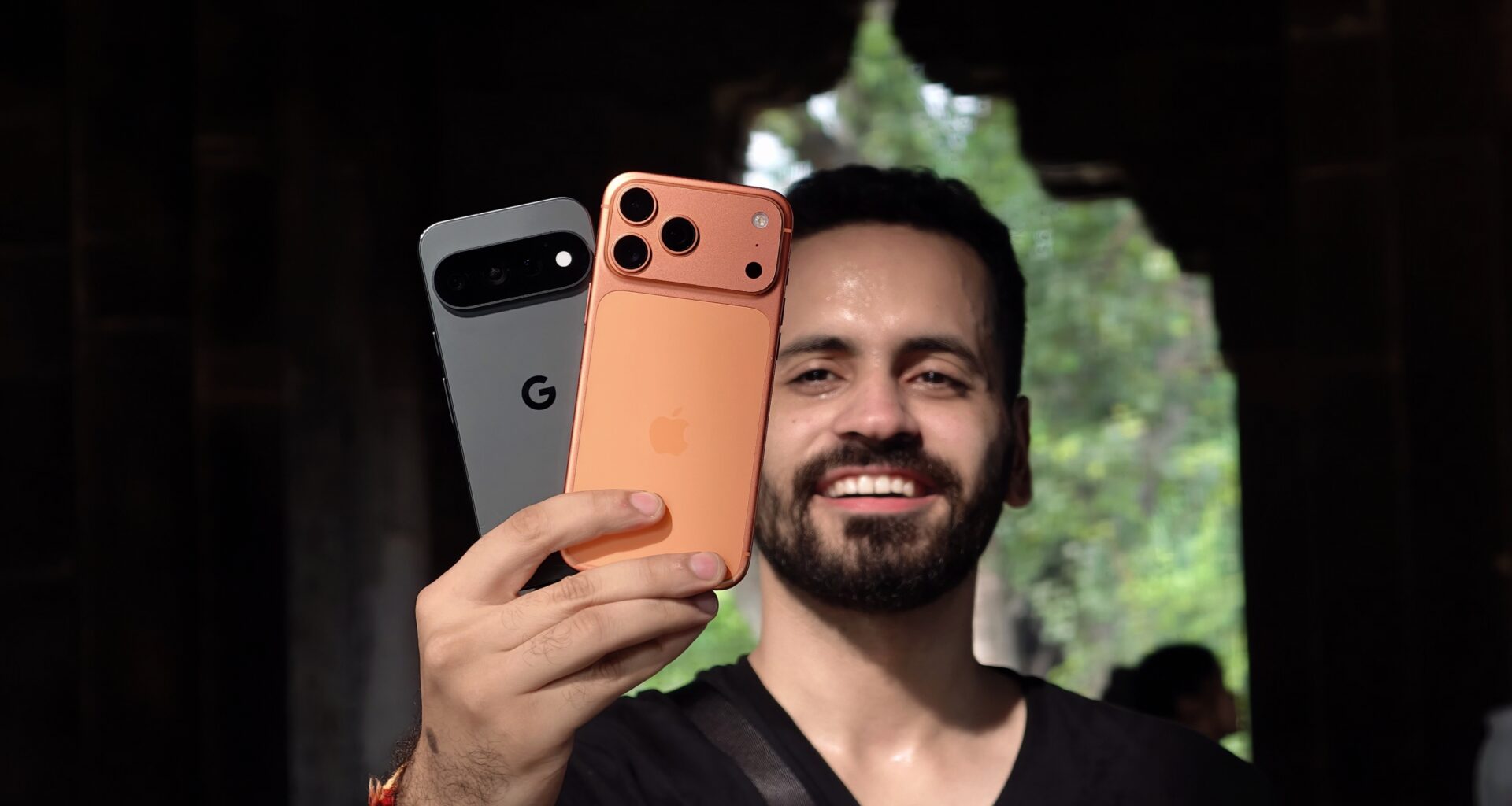 Prakhar Khanna holding Pixel 11 Pro and iPhone 17 Pro