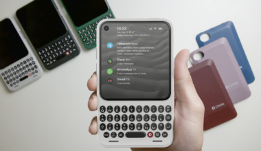 A hand holding the Clicks Communicator