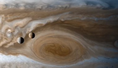 Two moons transit Jupiter during Cassini's 2000 Jupiter flyby. Credit: NASA/JPL/University of Arizona.