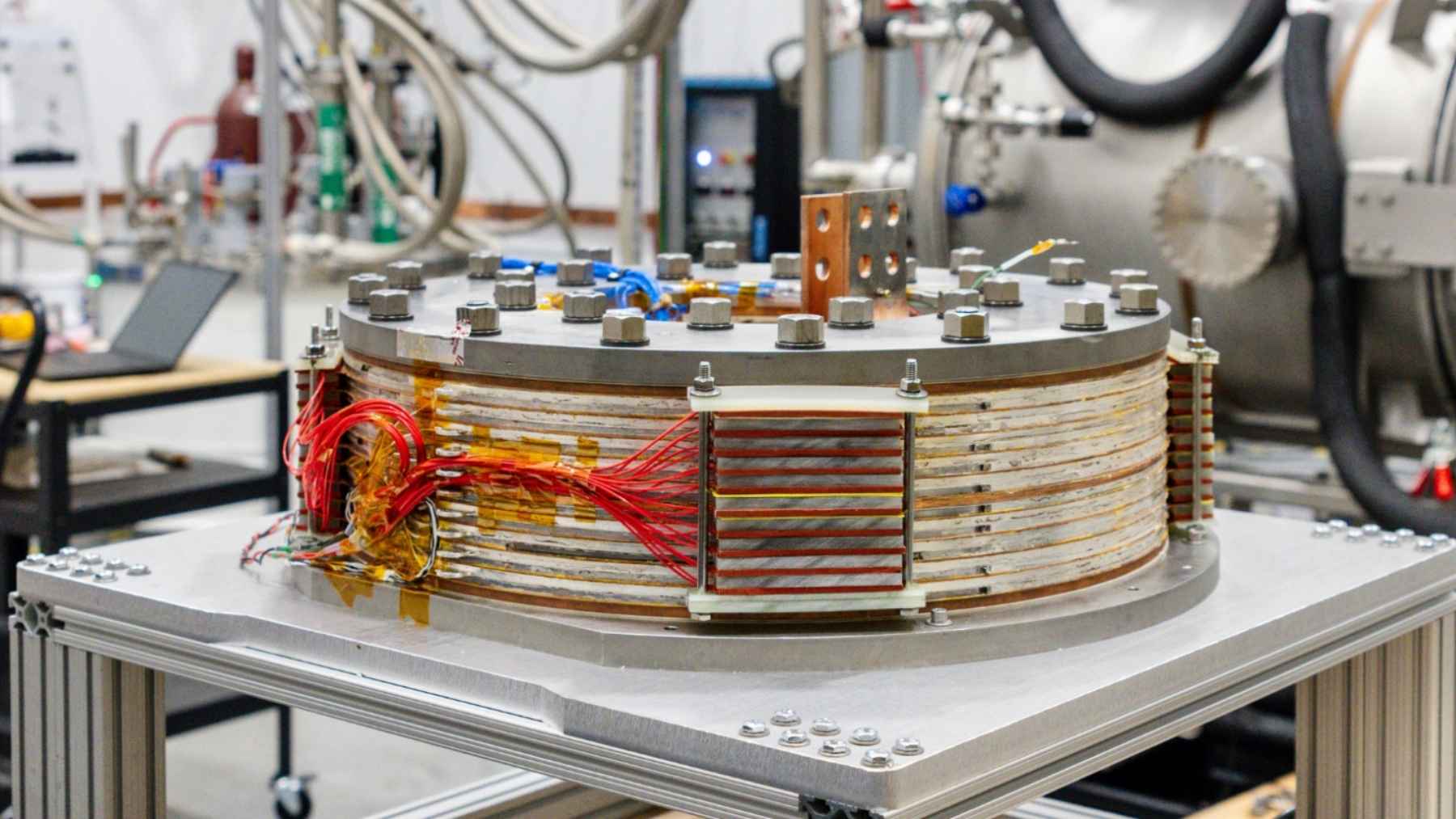A flat fusion magnet built in a New Jersey shop hit 6 tesla at 424 degrees below zero, and the startup behind it wants 300 identical copies to do the job Germany’s stellarator does with 50 twisted coils in five shapes