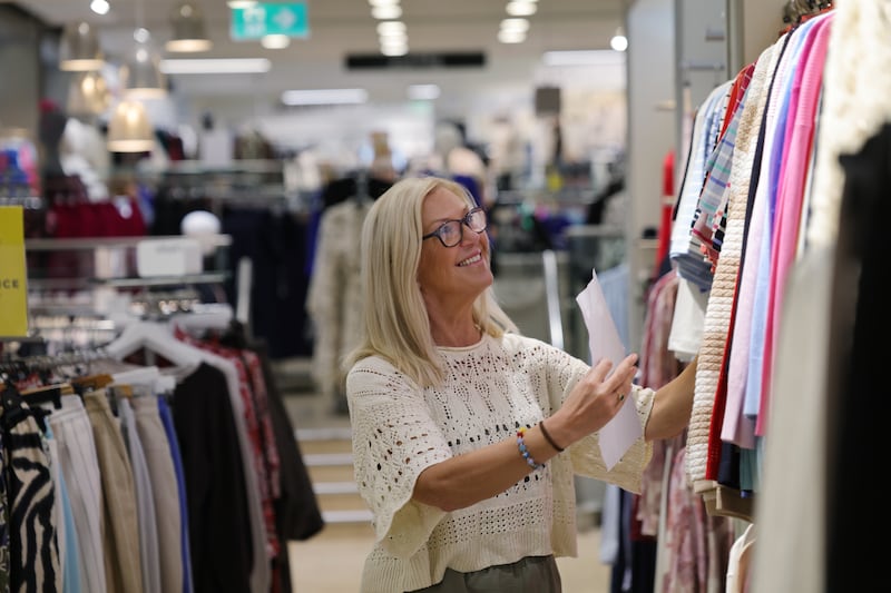 Lorraine Doherty at work in the ladies' fashion department. Photo: Bryan O’Brien / The Irish Times