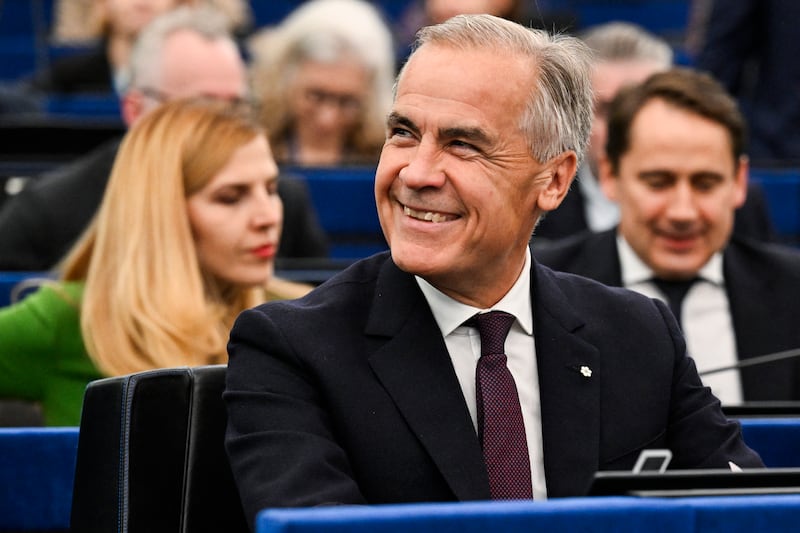 Canada's prime minister Mark Carney smiles as he listens to the European Commission president. Photograph: Jean-Christophe Verhaegen/AFP via Getty Images