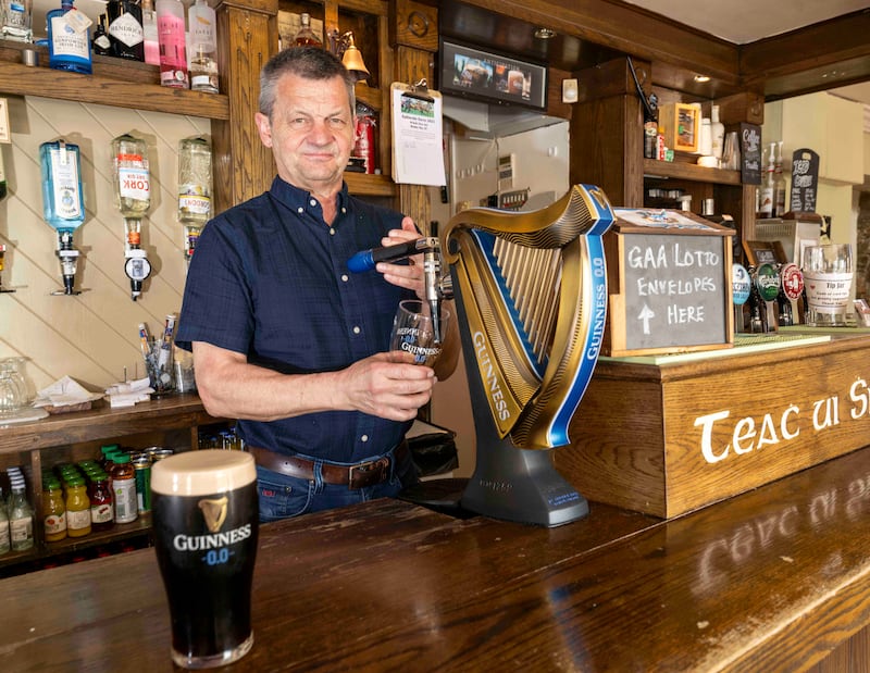 Cathal Sheridan of Sheridan’s Bar and Restaurant in Milltown, Co Galway, now offers punters food and a golf simulator. Photograph: Andrew Downes/xposure