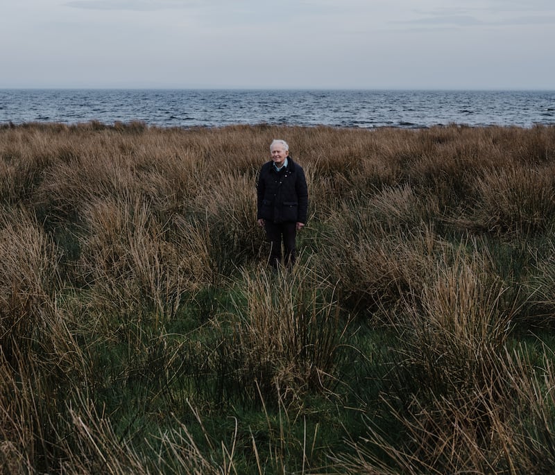 Danny Donnelly stands where a person would in earlier decades have been submerged in water, before the lough was artificially lowered in 1959. A geographer who studied the lough and its social conditions extensively over a decade, he published On Lough Neagh’s Shores in 1986. Photograph: Joe Laverty