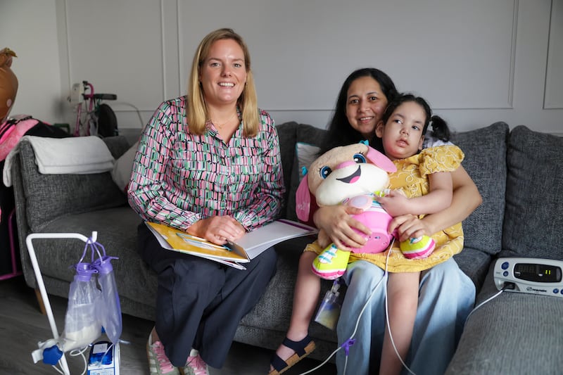Dublin North clinical nurse co-ordinator for children Alison Cashell with Emiliya Joseph and her daughter, Eva. Photograph: Enda O'Dowd