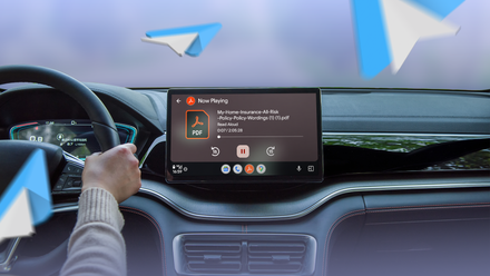 A driver listening to a PDF with Adobe Acrobat on Android Auto