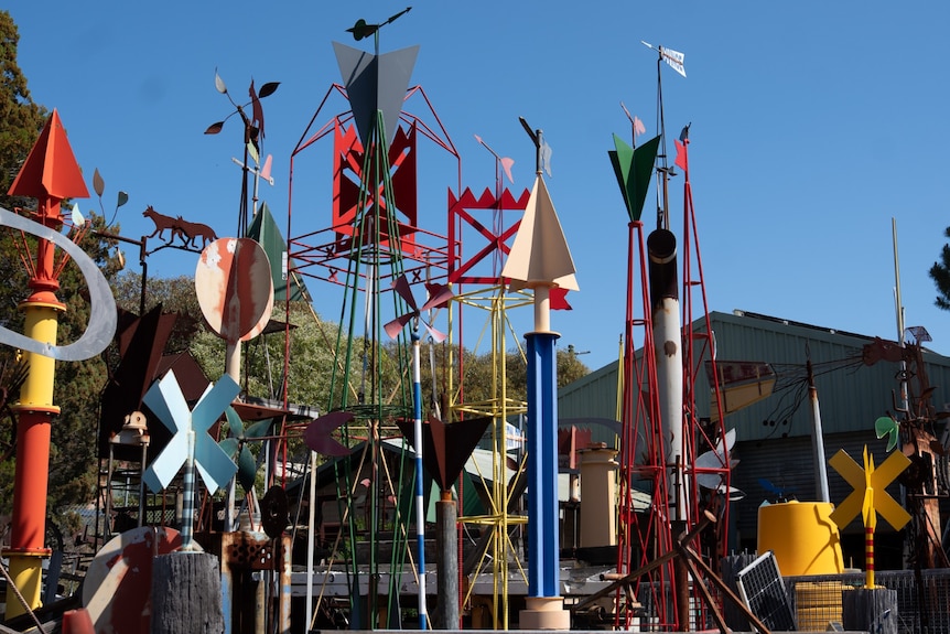 colourful martime signals can be seen in a yard