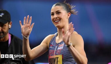 Amy Hunt smiles and waves after the 200m at the Ultimate Championship