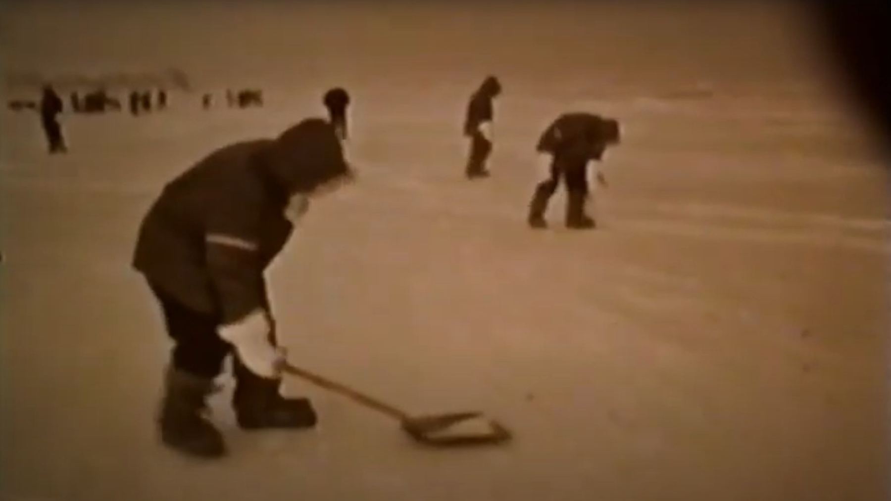 Workers sweeping Arctic ice after hydrogen bombs Thule B-52 crash in 1968, airmen walked fifty