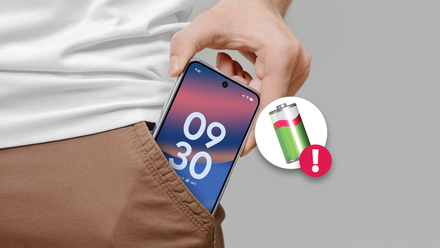 Android phone in a pocket beside a battery warning icon.