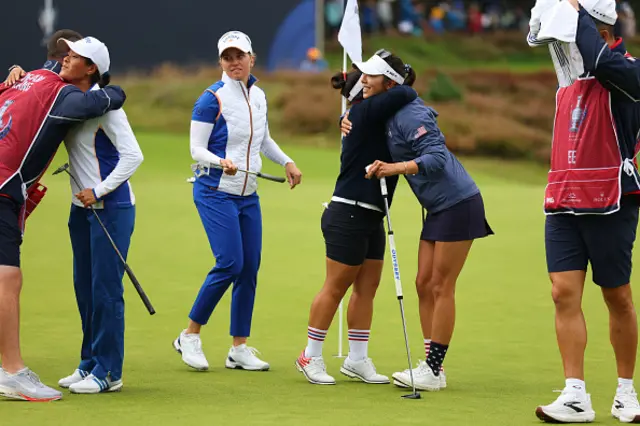 Megan Khang of Team United States hugs Alison Lee of Team United States