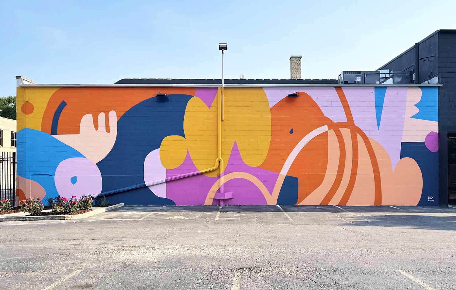 a colorful, abstract mural on a wall by Emmy Star Brown