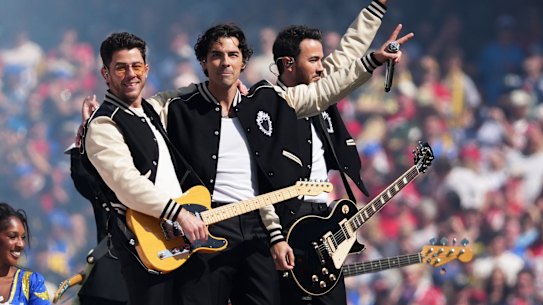 Nick, Joe and Kevin Jonas at the MCG.