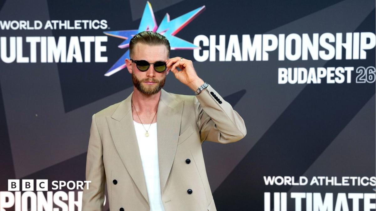 Josh Kerr poses for photos during the red carpet event at the World Athletics Ultimate Championship