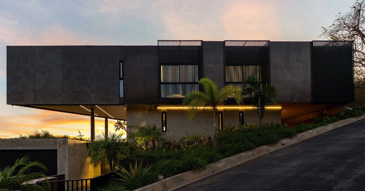 triangular residence by QBO3 arquitectos nestles on costa rican hillside