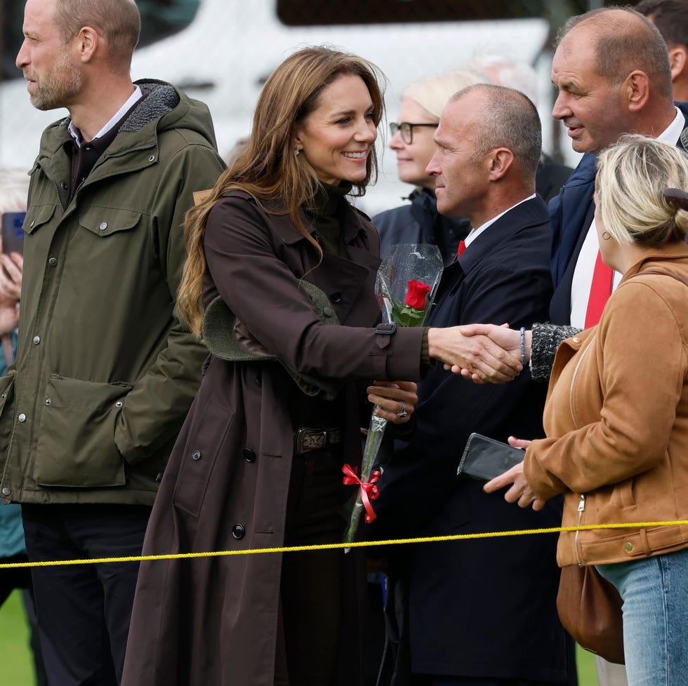 The Prince And Princess Of Wales Visit The Isle Of Bute rothesay, isle of bute, scotland september 17: catherine, princess of wales, shakes hands with a local woman while visiting bute shinty club in rothesay, during a royal visit to the isle of bute on september 17, 2026 in rothesay, isle of bute, scotland. the prince and princess of wales, who also hold the titles of the duke and duchess of rothesay, visited the island to celebrate community, connection and volunteering. (photo by jeff j mitchell/getty images)