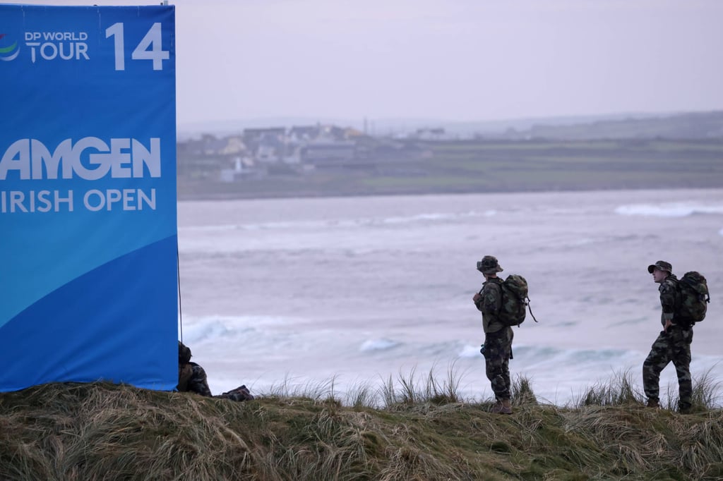 Members of the Irish army perform security checks at Trump International Golf Links Ireland in Doonbeg, Ireland, on Friday. Photo: AP