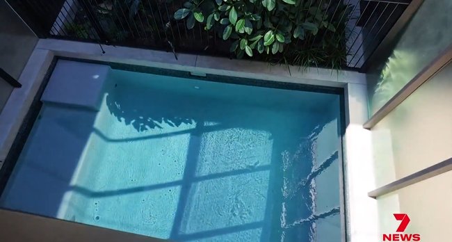 It features a shaded pool in the centre.