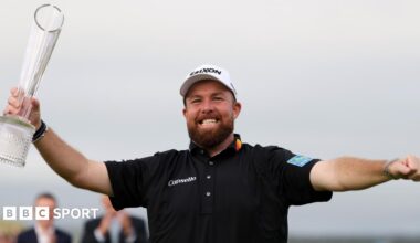 Shane Lowry poses with the trophy