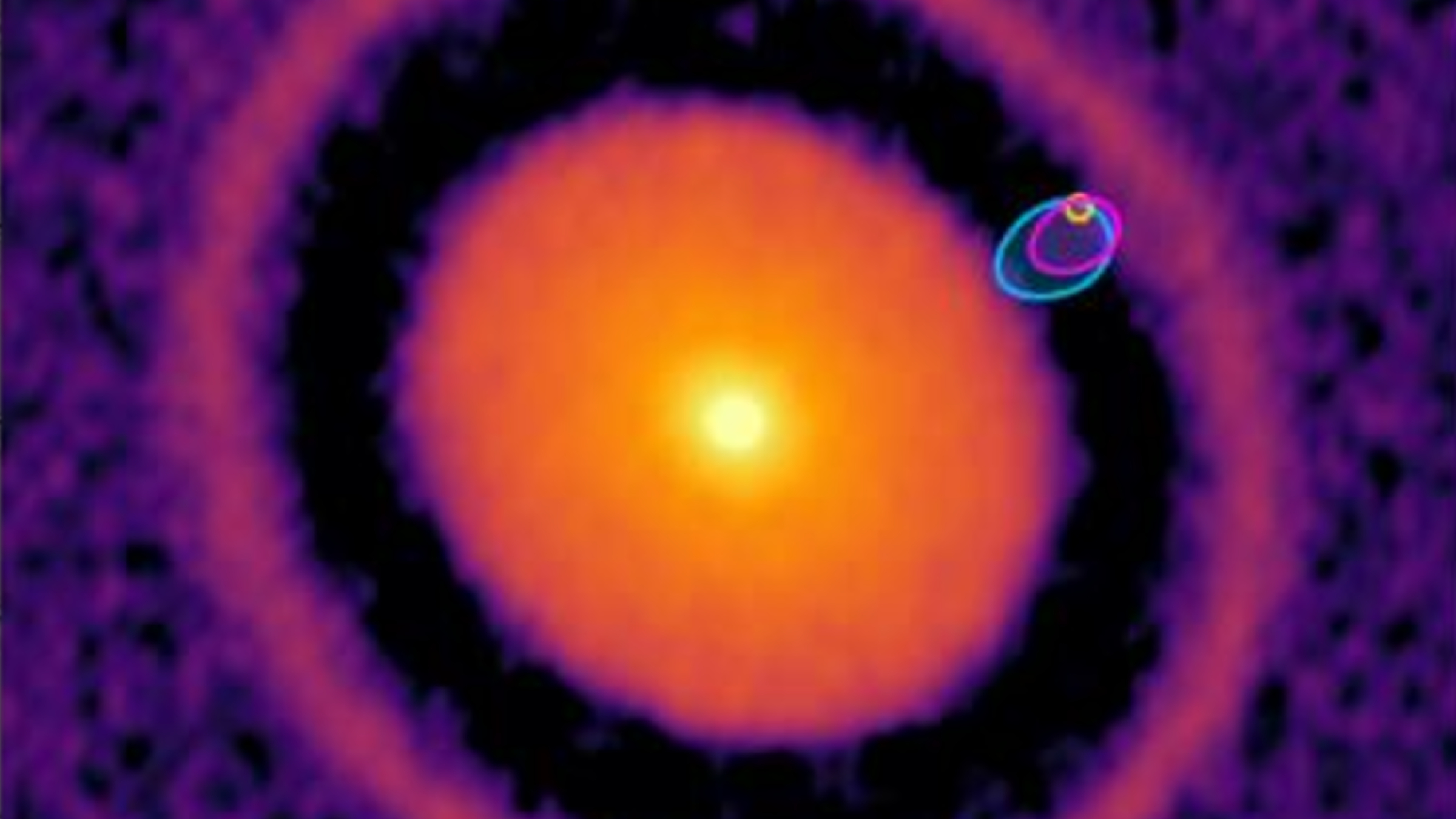Blurry false-color image showing the location of the new exoplanet relative to its star