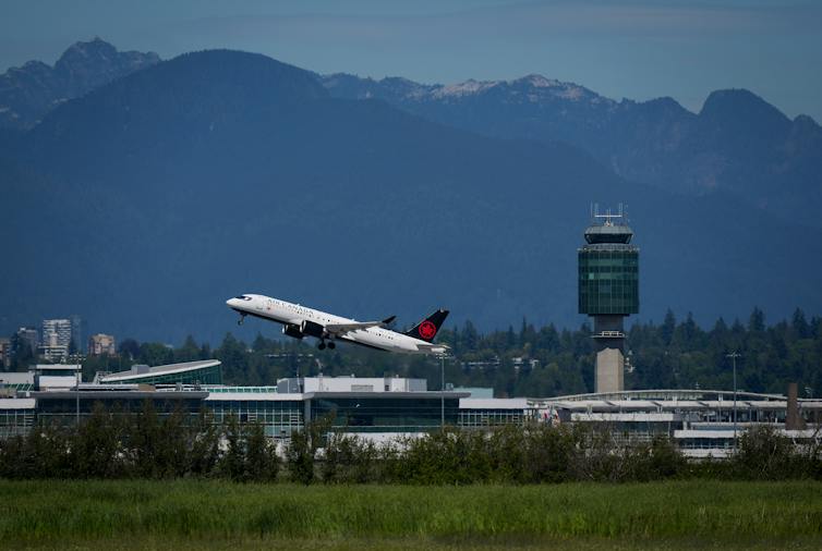 An airplane taking off from an airport