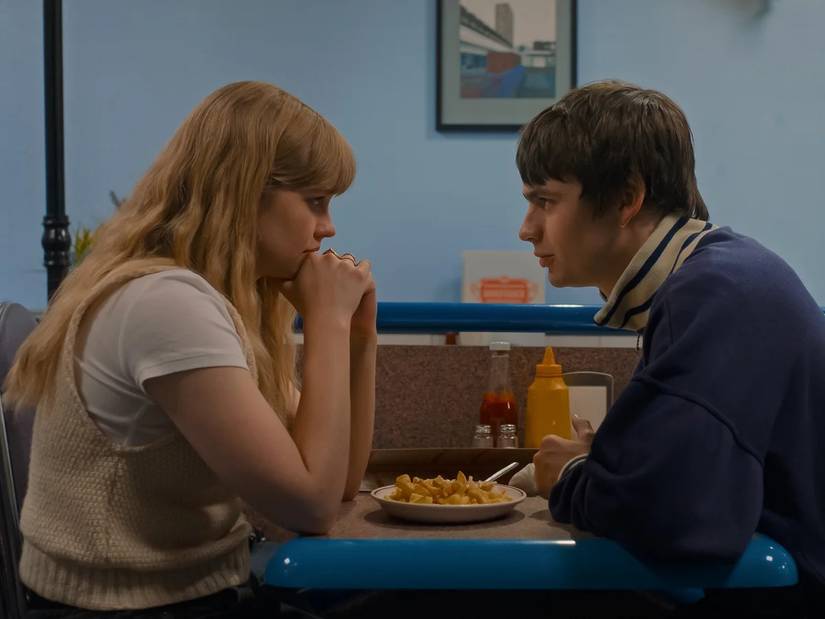 A woman and a man looking at each other in Finding Emily