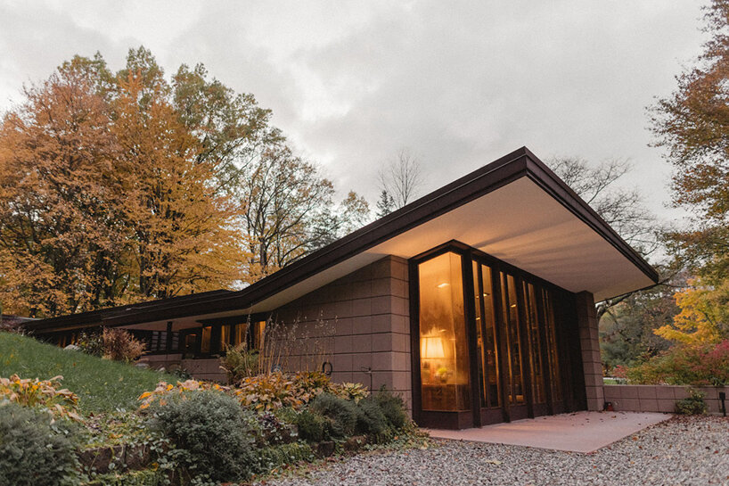 cantilevered roof extends over frank lloyd wright’s concrete usonian house - 2
