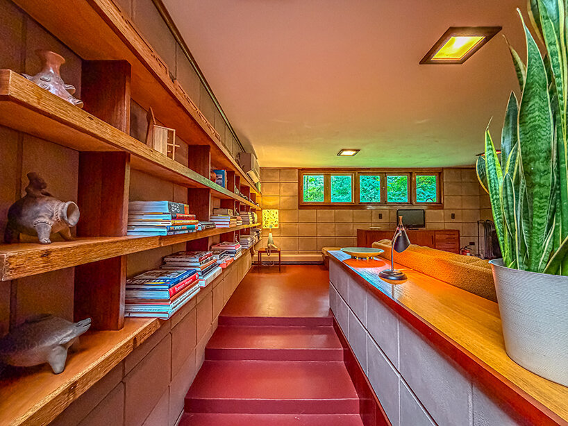 cantilevered roof extends over frank lloyd wright’s concrete usonian house - 3